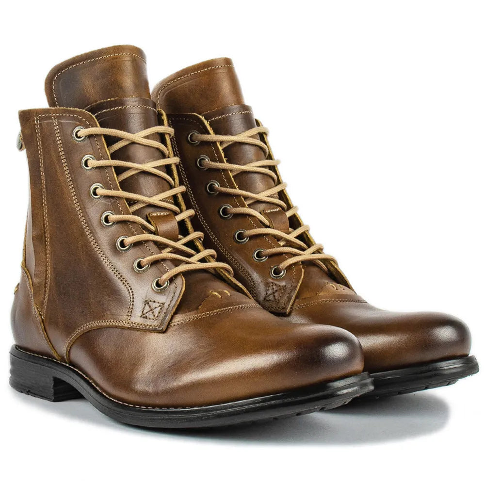 Black and brown two-tone men's leather boots with a side zipper, shown on a white background.