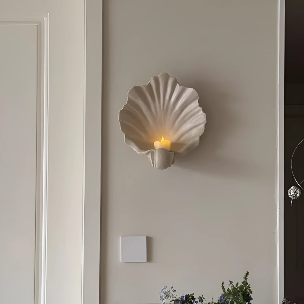 White resin simulation shell storage fruit plate ornament on a plain background.