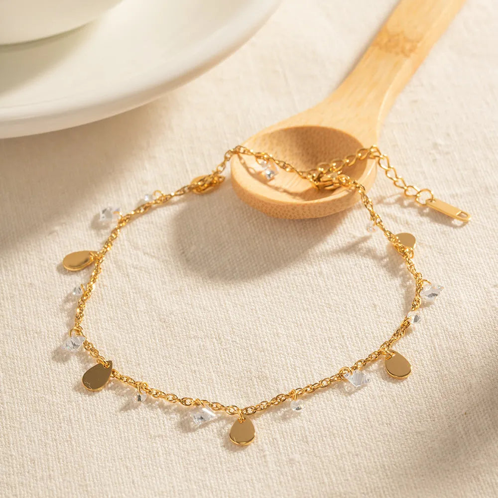 Women's stainless steel water drop tassel anklet with geometry shape design, colour JDAW2303012, on a white background
