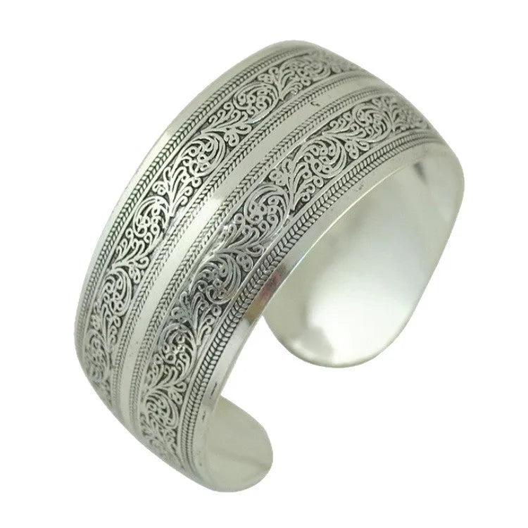 Carved openwork Miao silver style bracelet with Roman shape in alloy material