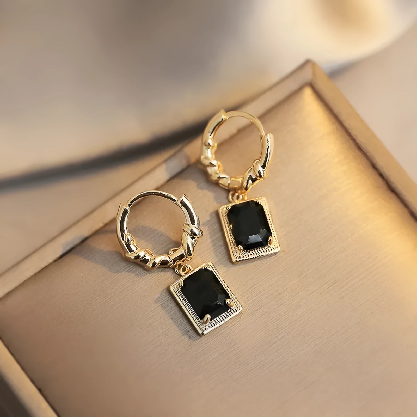Geometric quadrilateral copper earrings with black zircon stones in French court retro style