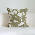 Green striped cotton linen hotel sample pillow with silk floss filler on a bed display.