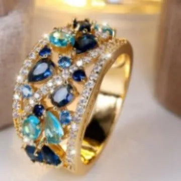Women's hollow round fashion ring in copper with choice of gold or platinum plating and colour finishes