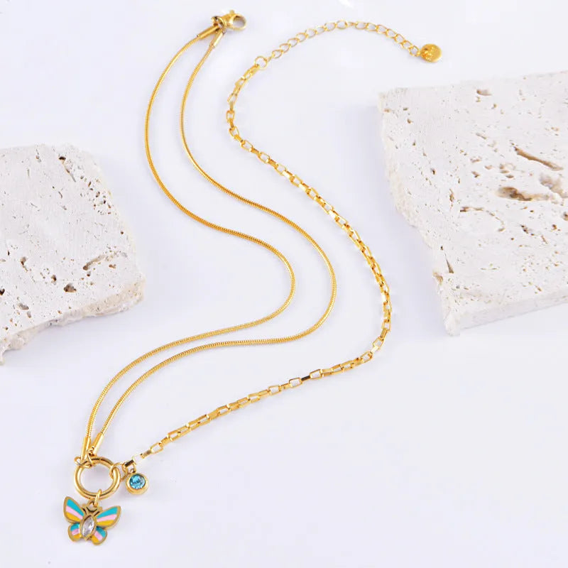 Gold titanium steel butterfly necklace and bracelet jewellery set with snake bones chain