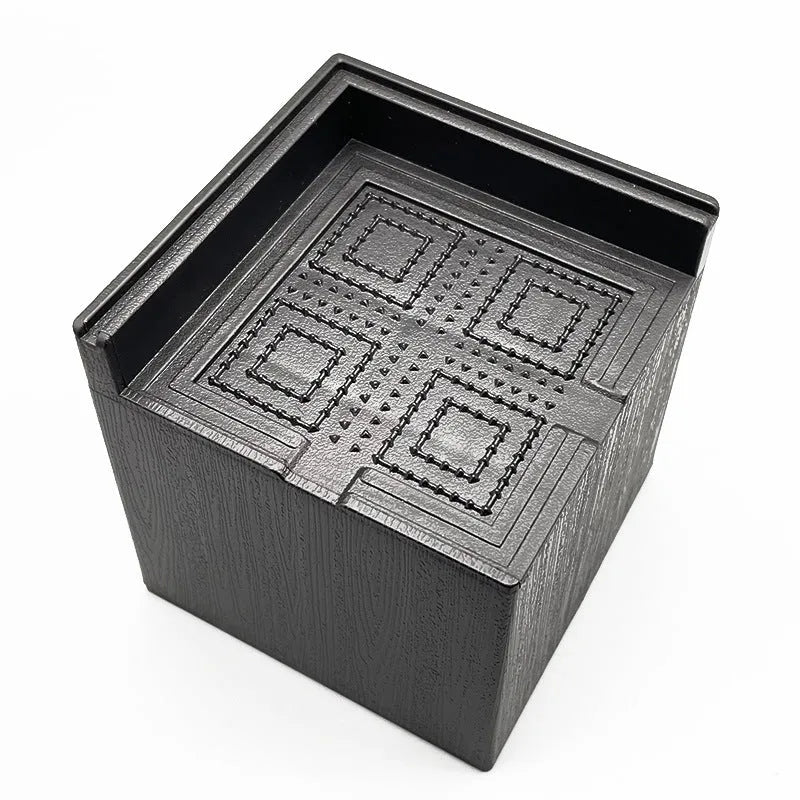 Black plastic furniture foot mat set of four for height adjustment on hard floors