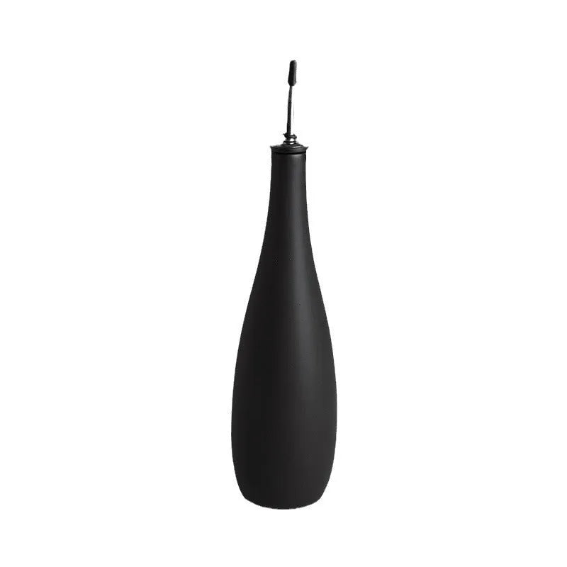 Ceramic kitchen oil pot with funnel and brush in black, coffee, or white colour, 650ml capacity.