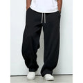 Men's grey casual trousers with drawstring waist and straight leg design on hanger