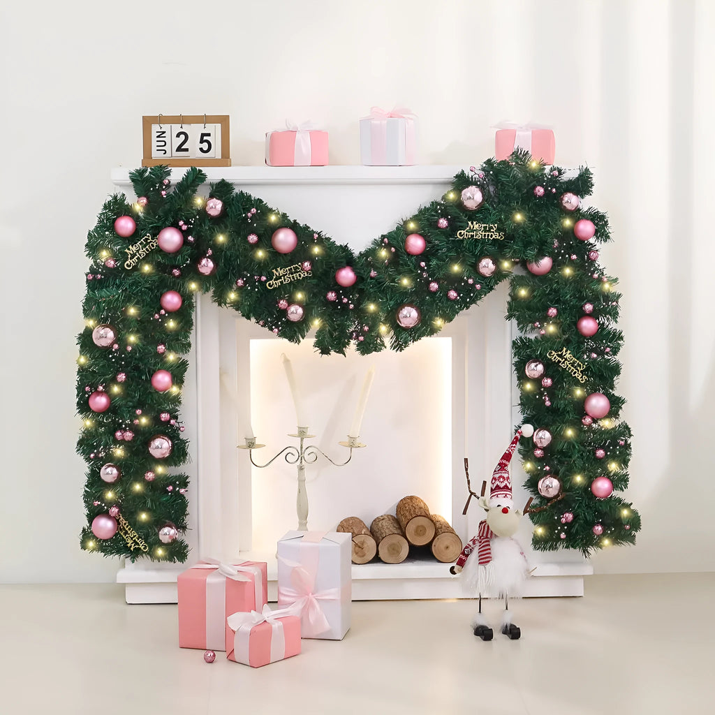A long, pink artificial rattan Christmas garland with small fruits and leaves, shown draped decoratively.
