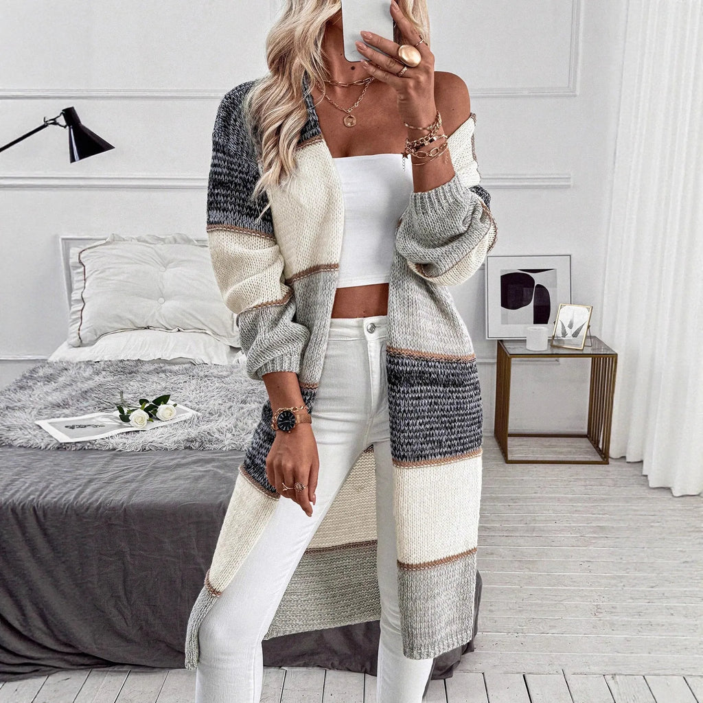 Grey striped knitted long cardigan with loose fit and long sleeves