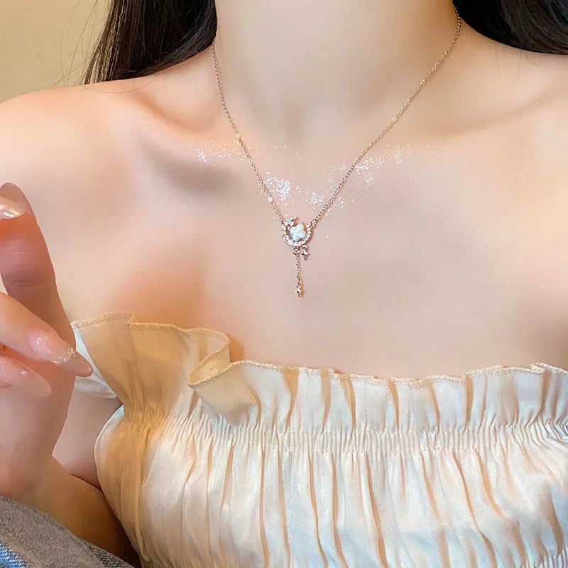 Gold star moon zirconium necklace on display with alloy pendant and adjustable chain