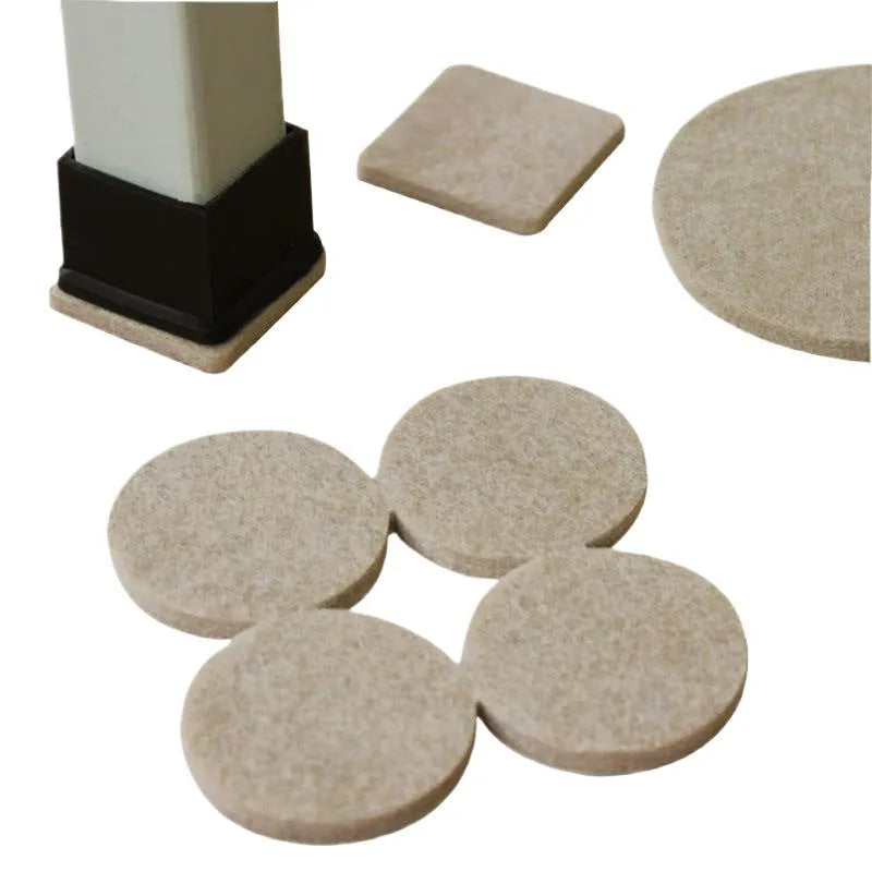 Beige plastic furniture leg protection pads in round and square shapes on wooden floor