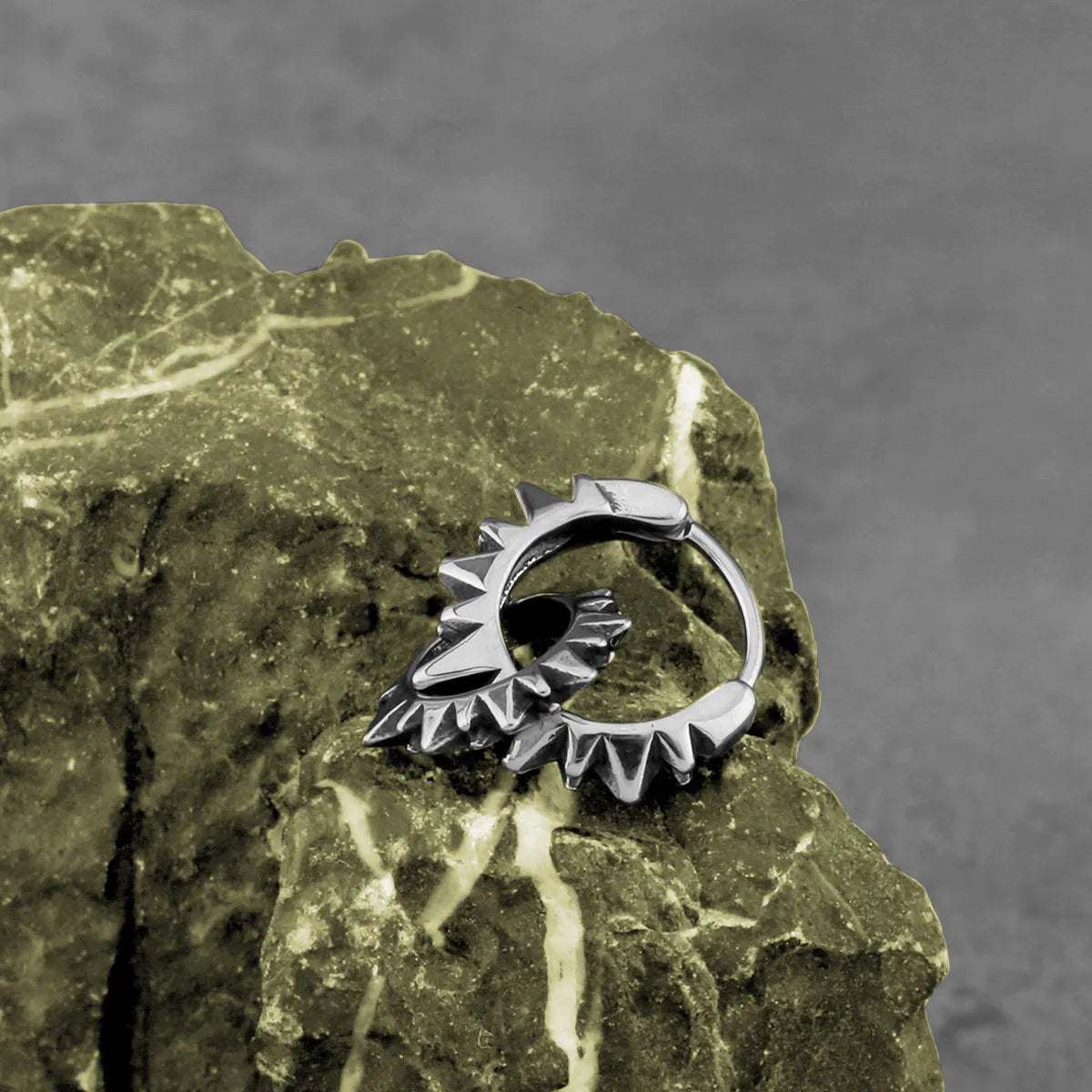 Polished stainless steel round ring earrings in retro style with steel colour finish