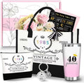 Boxed aromatherapy candle gift set with various modern soy wax designs including pink and sunflower themes.
