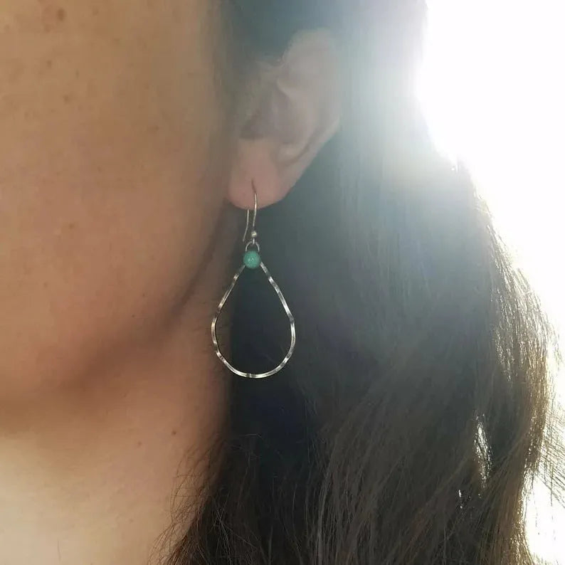 Geometric circle earrings with antique silver finish and turquoise tone, bohemian vintage style