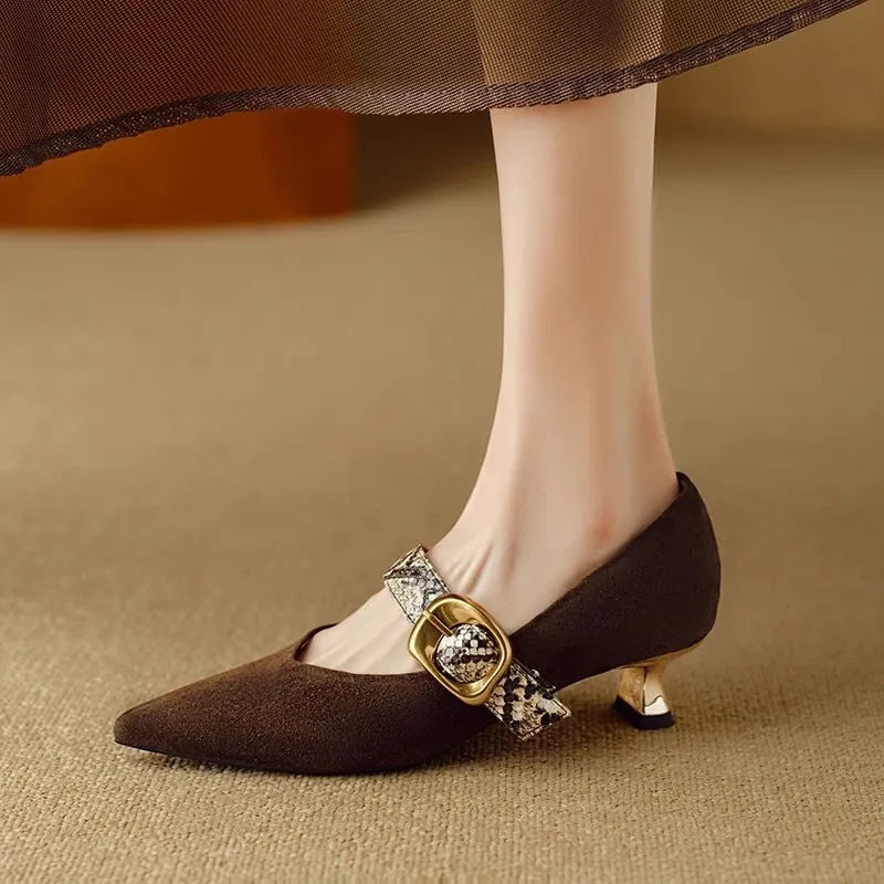 Women's black pointed high heels with stiletto heels and buckle closure