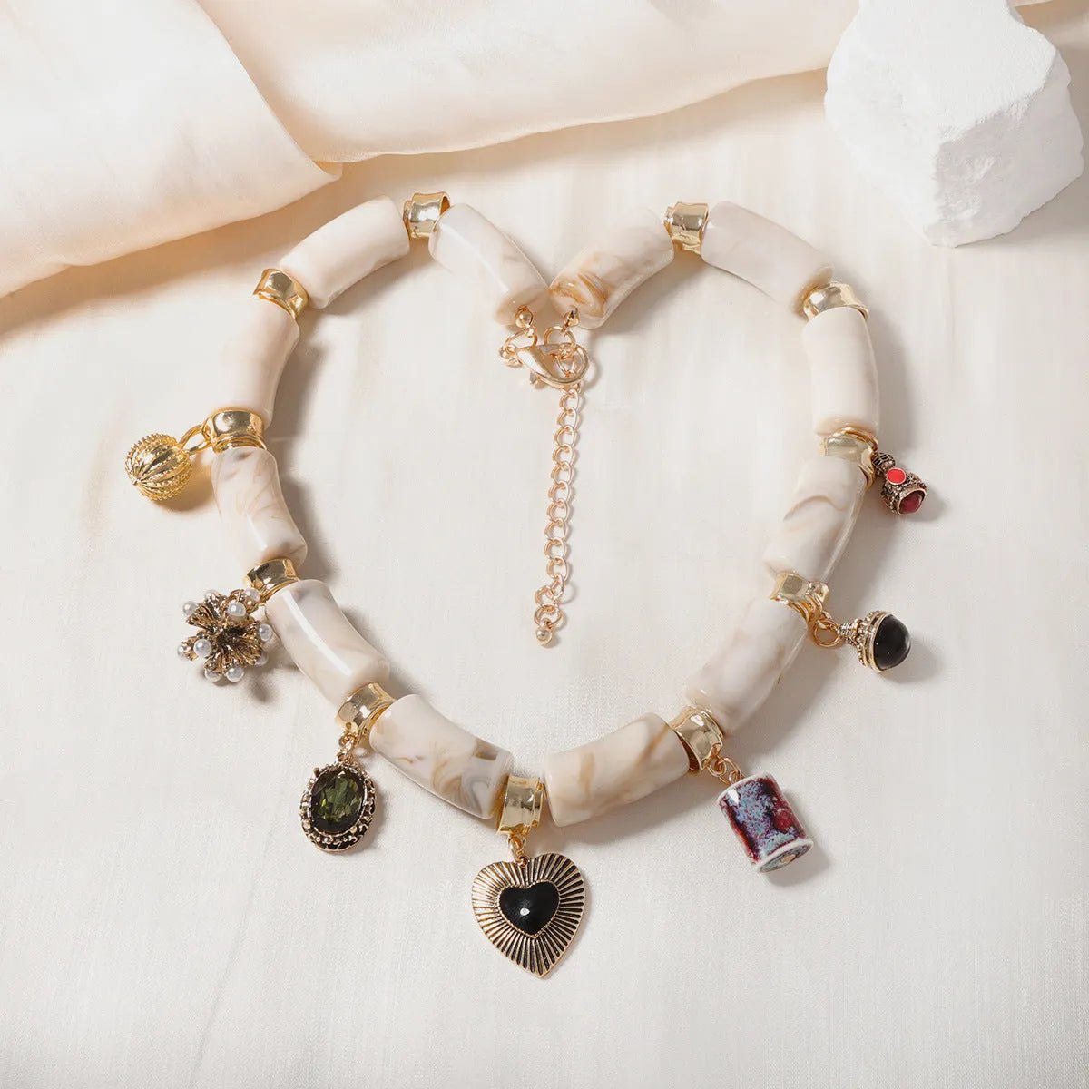 Heart-shaped resin bamboo necklace with electroplated finish in picture colour