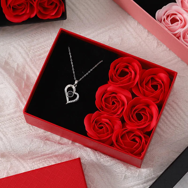 Korean style gift box containing six red soap roses with a matching handbag.