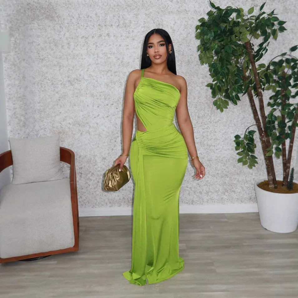 Women's solid colour long one-shoulder pleated dress in milk silk fabric, shown on a model.