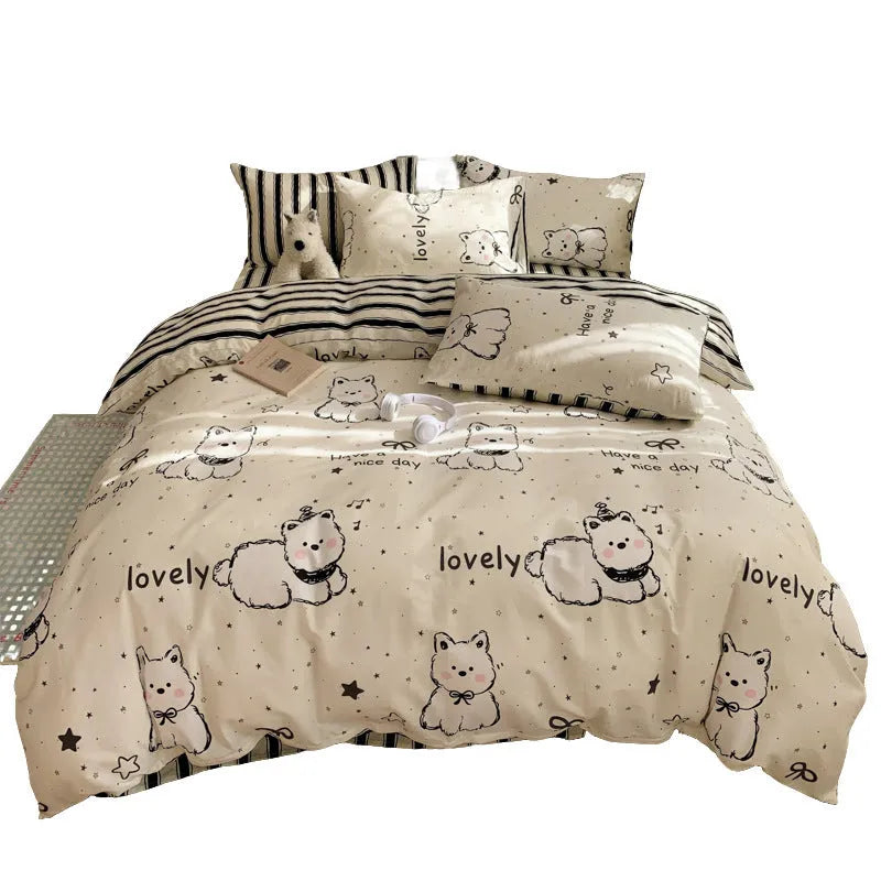 Cartoon dog pattern pure cotton duvet cover and pillowcase set on a bed.
