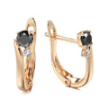 Gold drop-shaped women's earrings with a black agate stone inlay and retro geometric design.