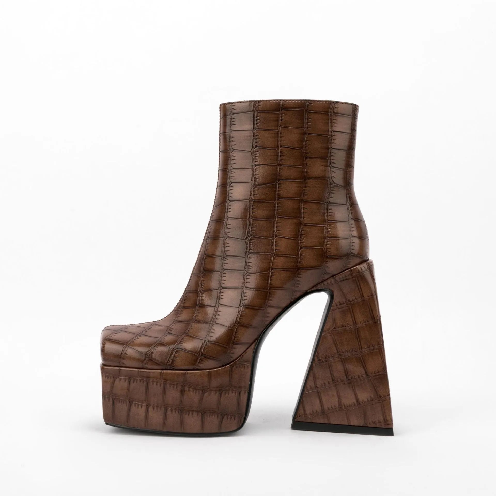 Women's ankle boot with a high heel, shown in a solid colour, made from artificial PU leather.