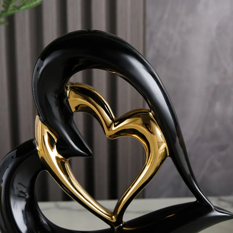 White porcelain love heart ornament in modern geometric style with 1939 Black Gold colour finish on shelf