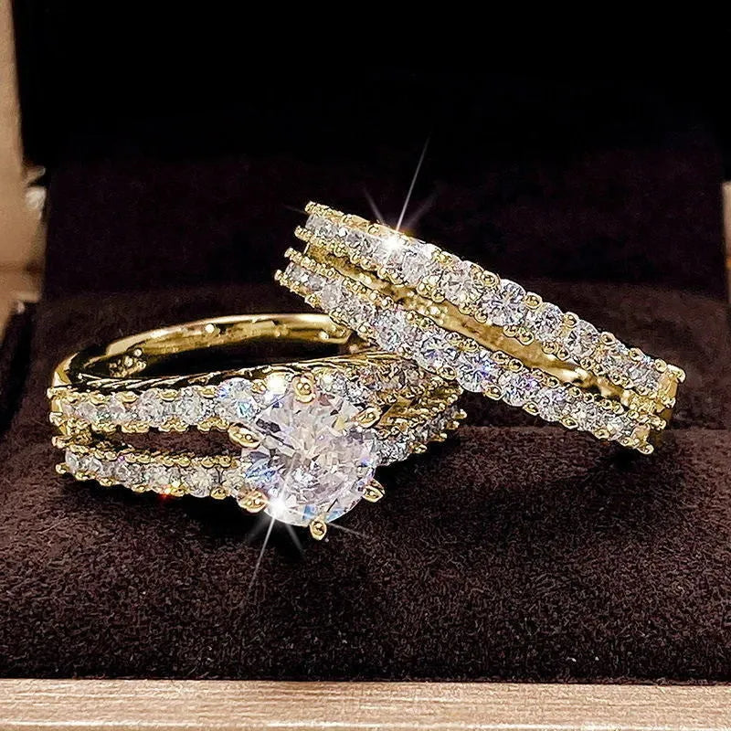 Two interchangeable geometric fashion rings with fully-jewelled round elements in gold, rose gold or silver colours