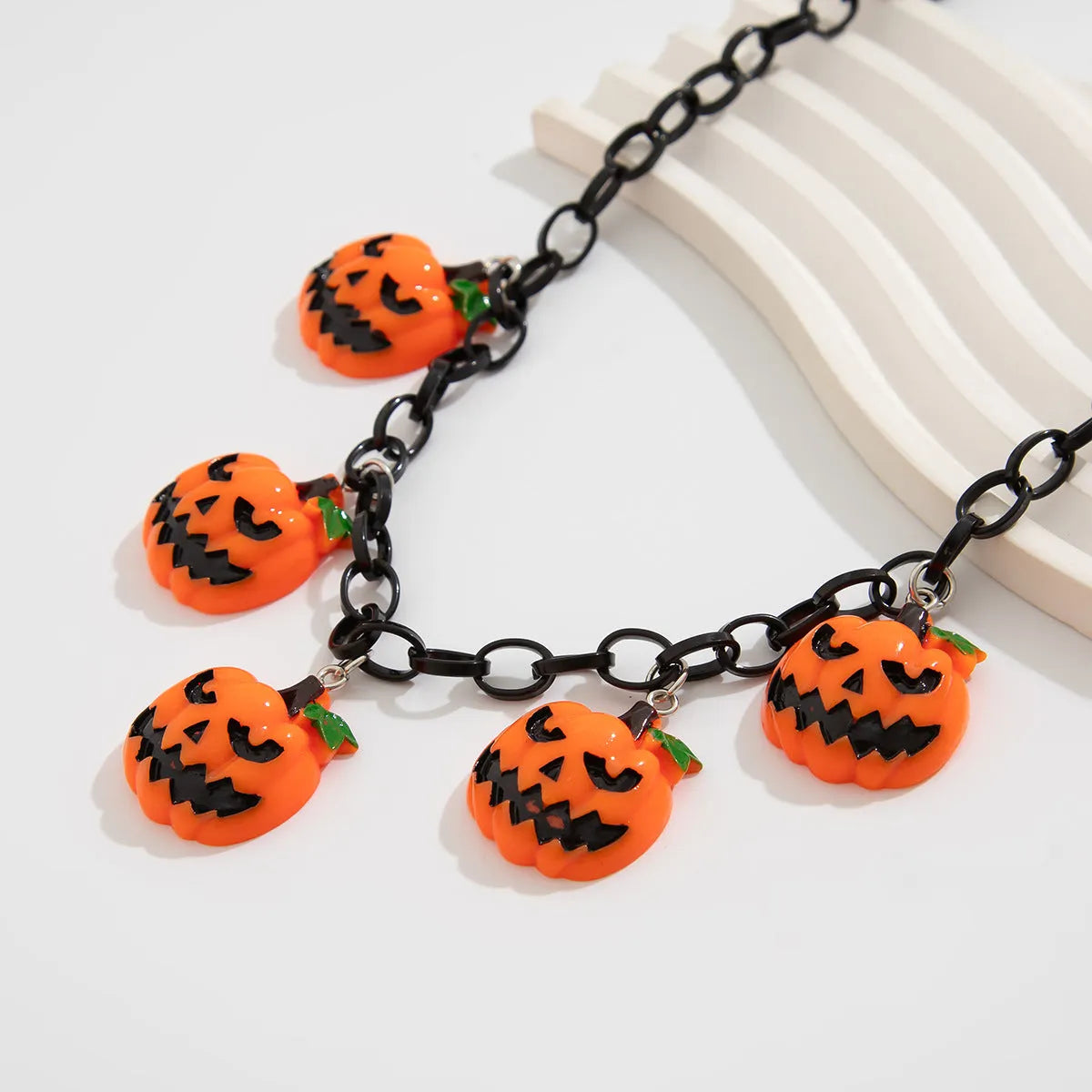 Halloween necklace with acrylic ghost and pumpkin pendant in mixed colours on regular chain