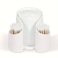 Modern plastic dental floss storage box in solid colours pink, white, blue, and black
