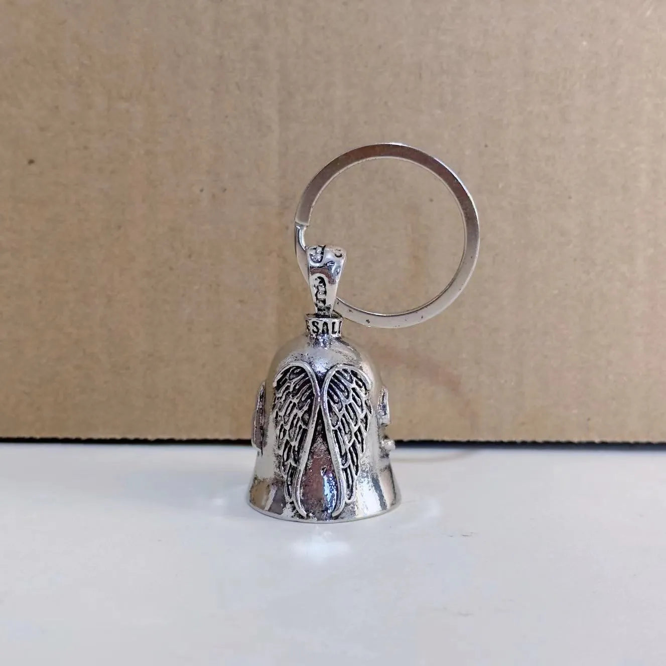 Vintage angel feather necklace and matching keychain set with electroplated white gold tone finish