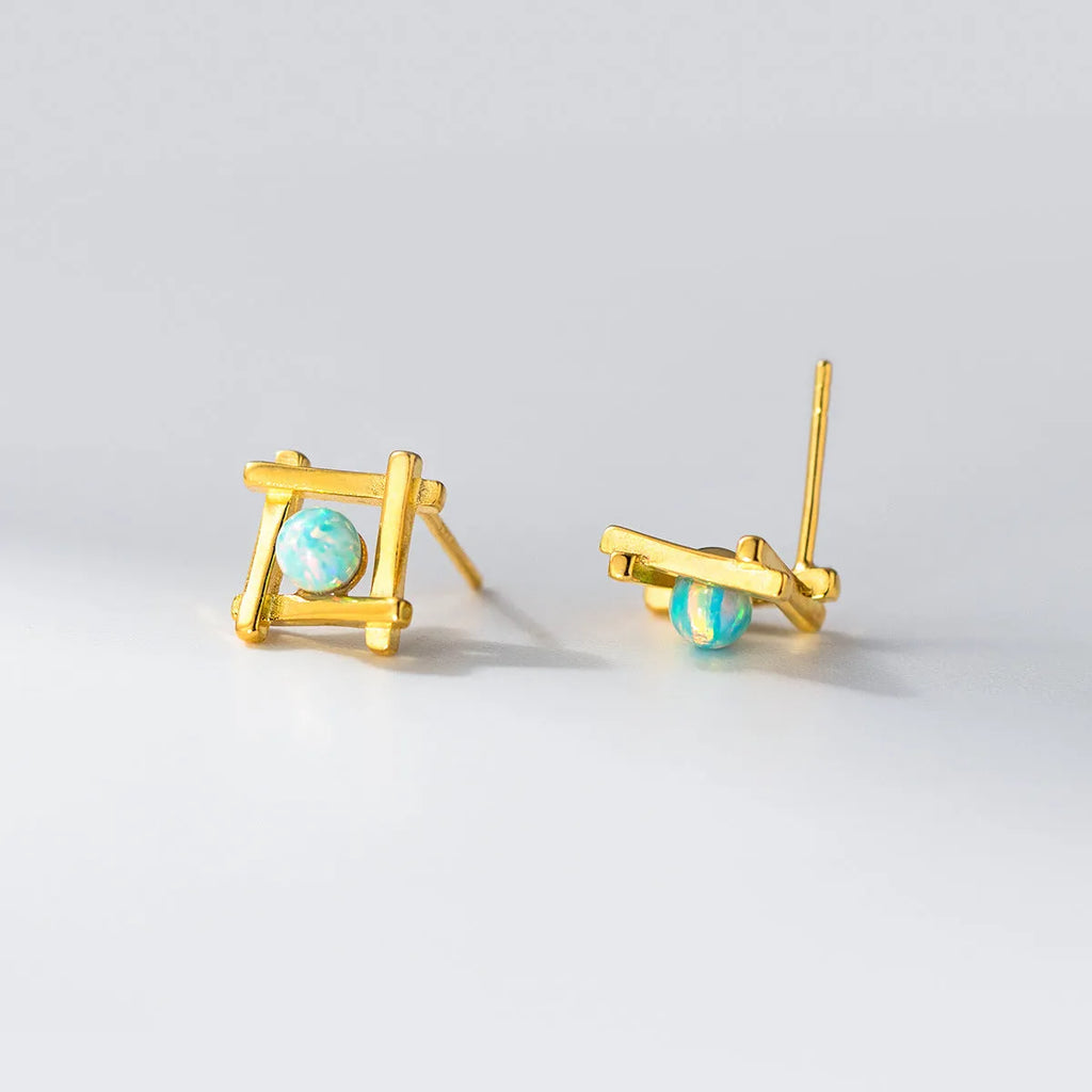 Geometric cross quadrangle stud earrings in 925 silver with Seiko treatment, silver and gold colour options