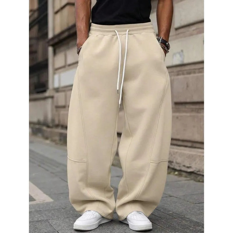 Men's high-waist straight-leg trousers in bamboo blend fabric showing cropped length and elasticated waist