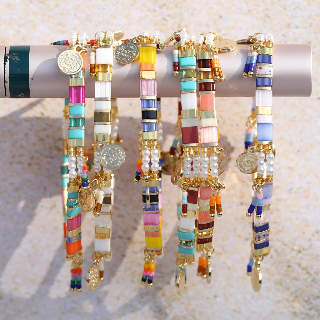 Women's imitation pearl beaded bracelet with glass coloured detailing in pearl lift colour options