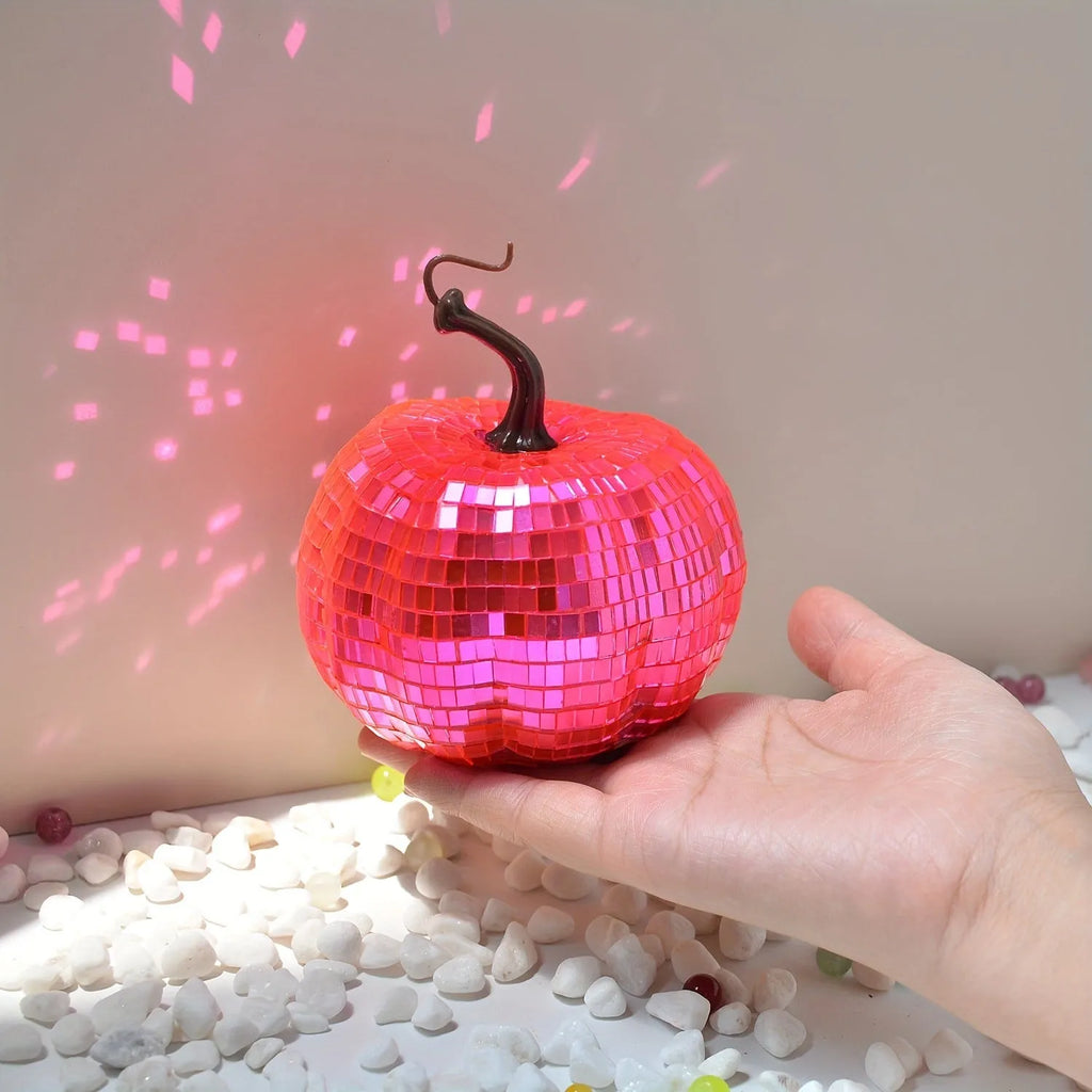 A detailed glass pumpkin decoration with embroidered finish, shown in multiple sizes for Halloween and Christmas.