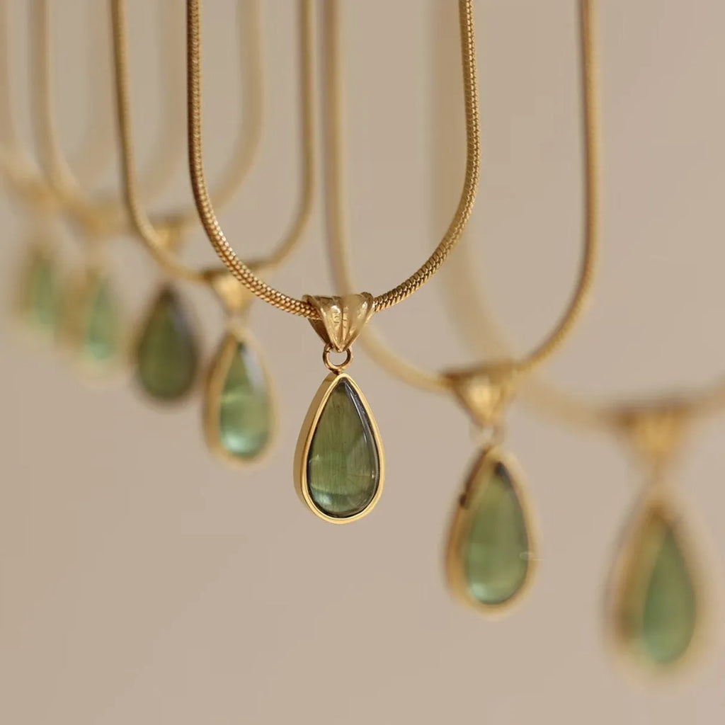 Retro blue and green water drop necklace with gem inlays on titanium steel snake bone chain