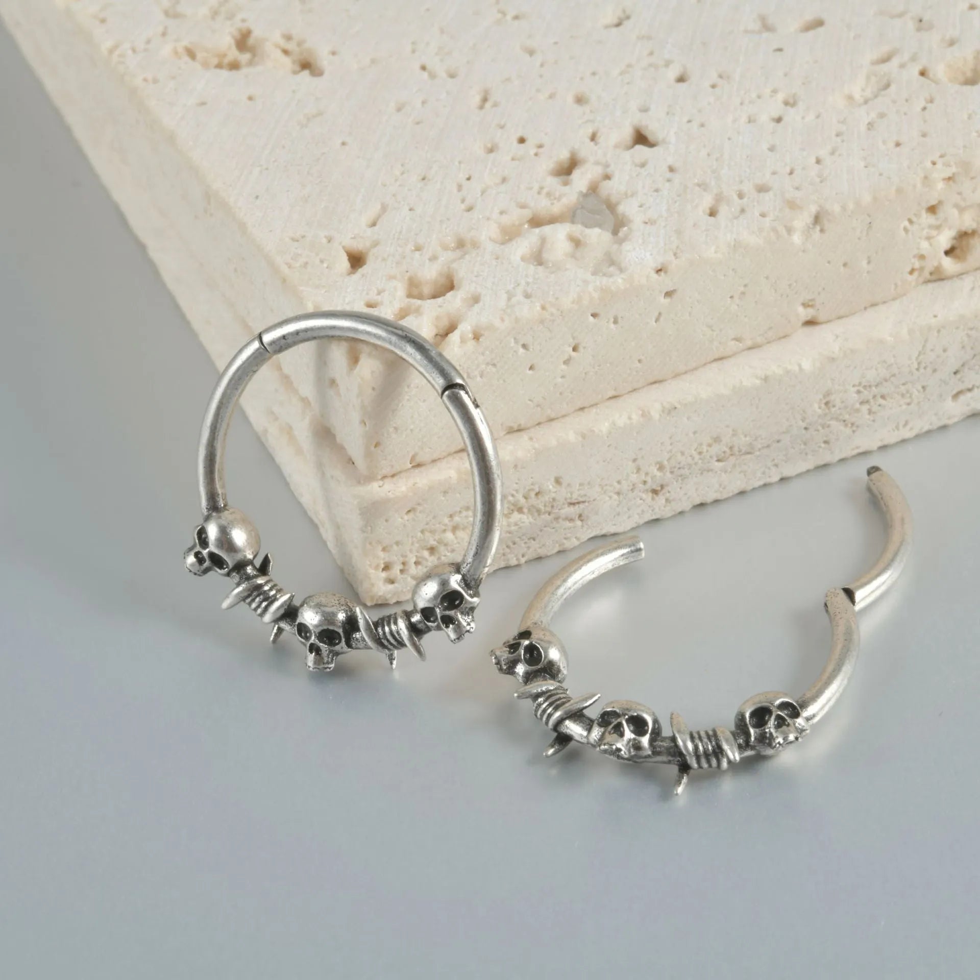 Copper punk earrings with ghost head design in ancient silver finish