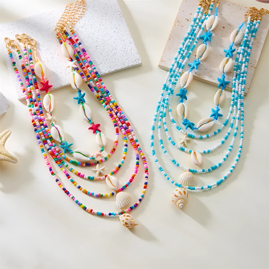 Five multi-layer women's necklaces with shell, starfish and conch beads on adjustable chains