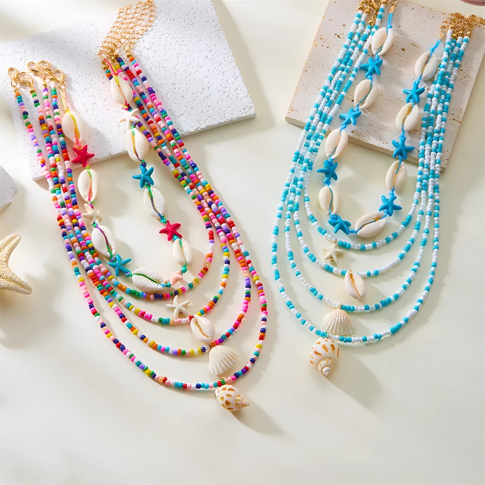 Five multi-layer women's necklaces with shell, starfish and conch beads on adjustable chains