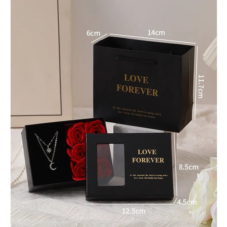 Korean style gift box containing six red soap roses with a matching handbag.