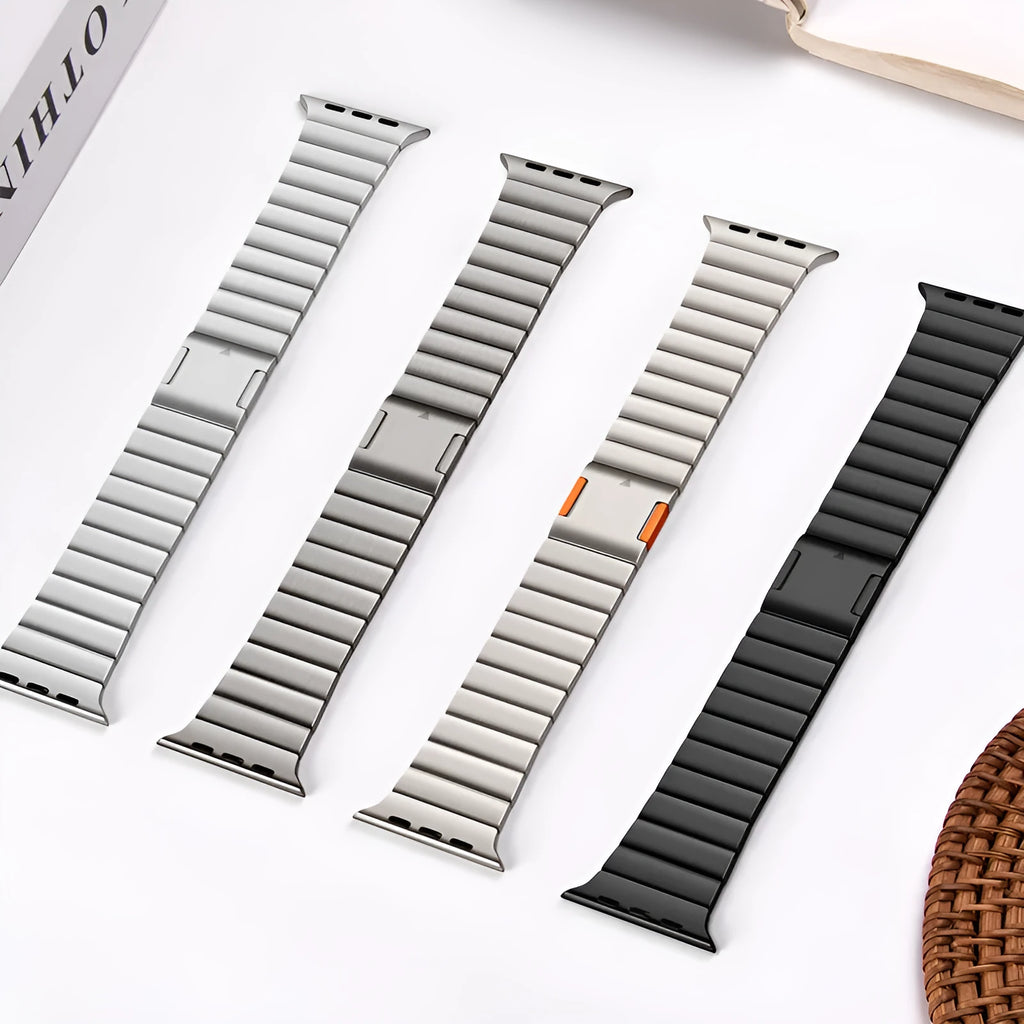 Stainless steel Apple Watch strap with magnetic buckle in silver colour.