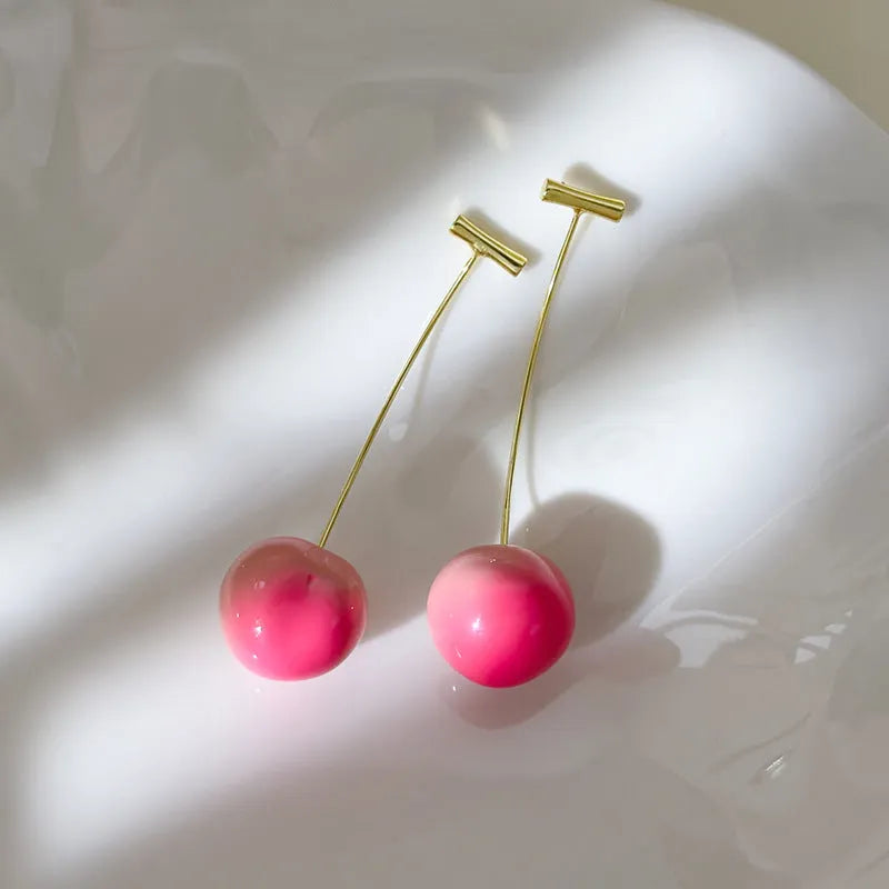 Acrylic peach fruit earrings with silver-tone copper posts in small and large size options
