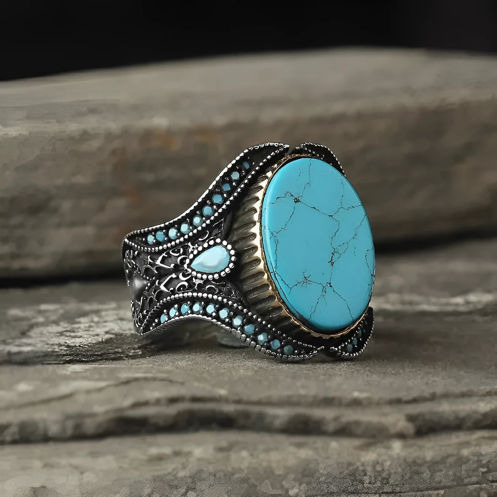 Men's round turquoise alloy ring with antique silver finish showing circular band design