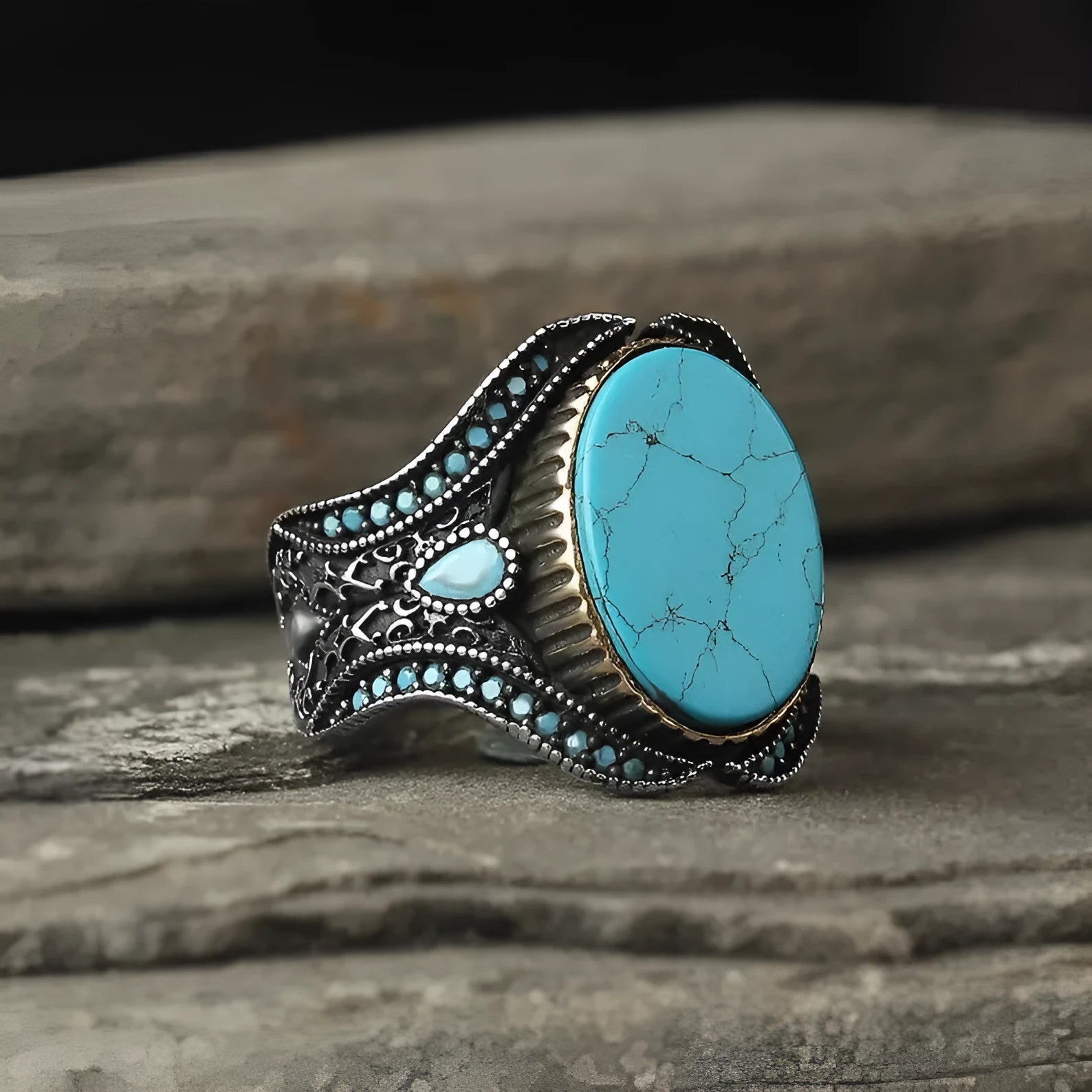 Men's round turquoise alloy ring with antique silver finish showing circular band design