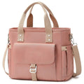 Portable cube-style picnic bag with removable shoulder strap in black, green, or pink colour options