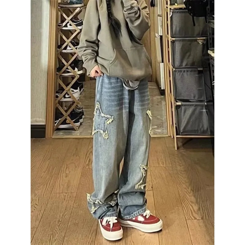 Women's blue high waist straight leg jeans with washed finish and cotton denim fabric