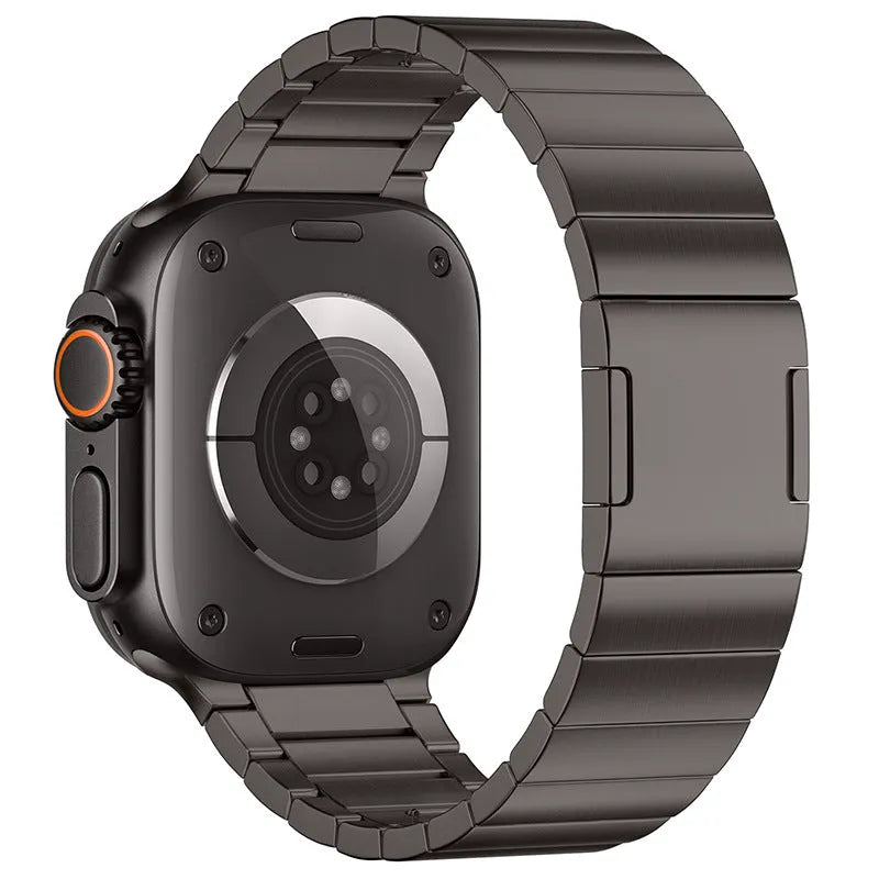 Stainless steel Apple Watch strap with magnetic buckle in silver colour.
