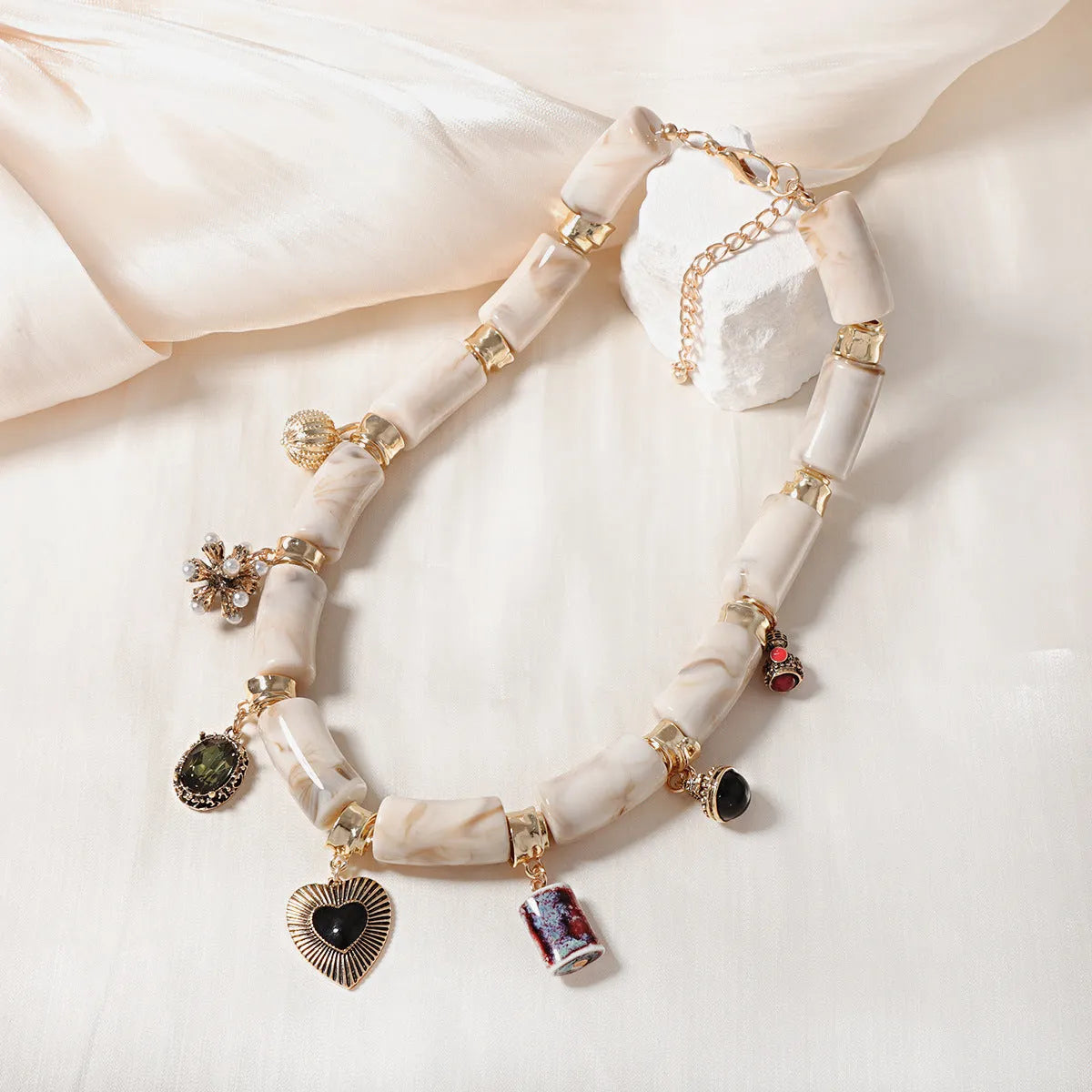 Heart-shaped resin bamboo necklace with electroplated finish in picture colour