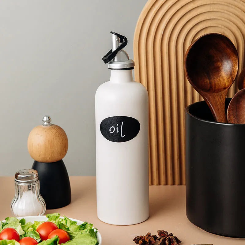 Ceramic kitchen oil pot with funnel and brush in black, coffee, or white colour, 650ml capacity.