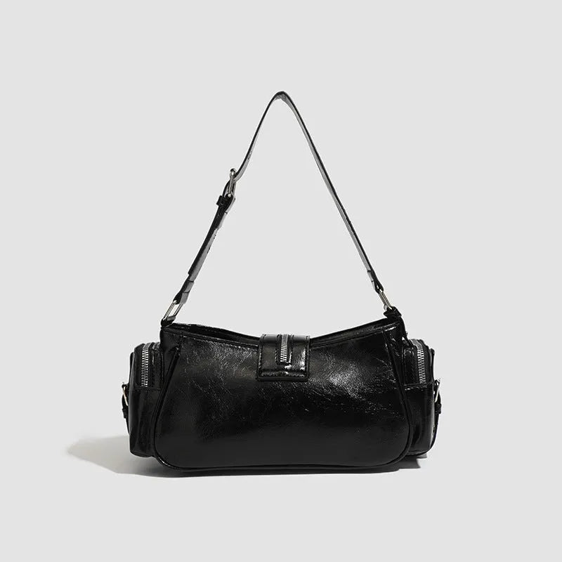 Black oil wax leather retro handbag with dumpling shape and multiple zippered compartments