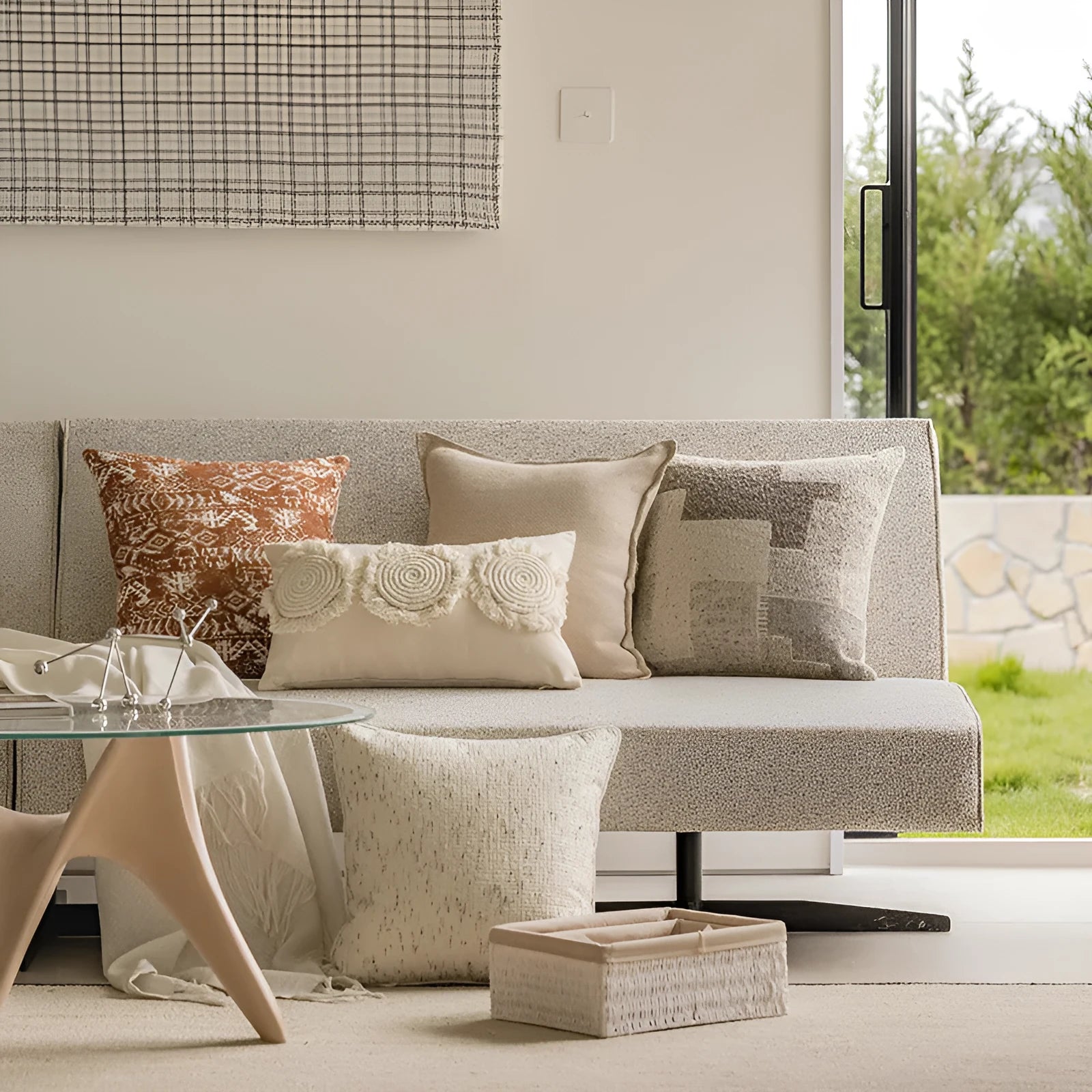 Solid colour decorative cushion on a sofa, showing its square shape and pp cotton filling.